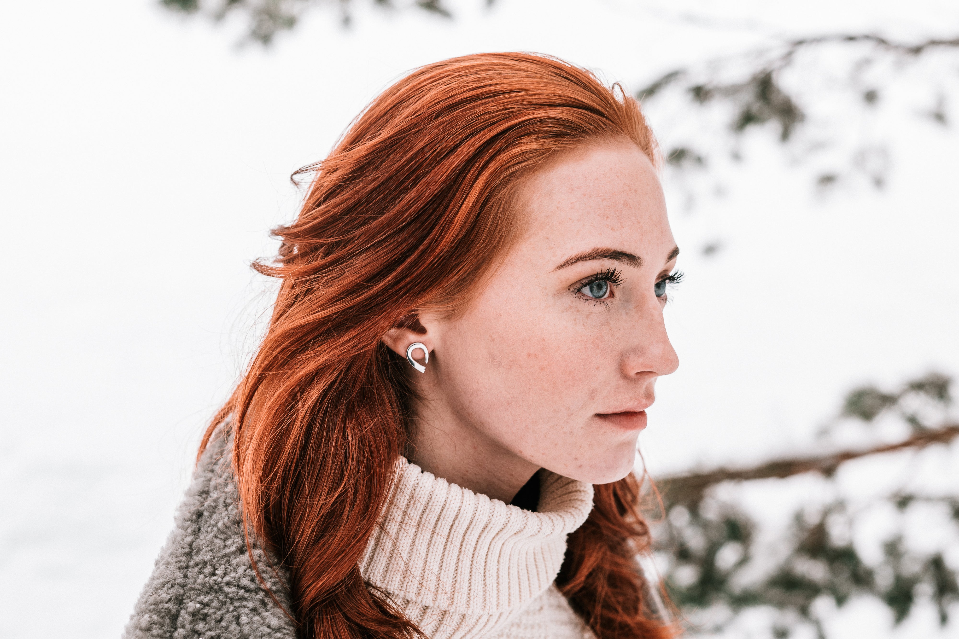 silver earrings in winter time