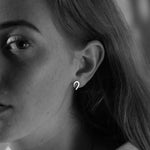 Silver earrings with a rounded shape