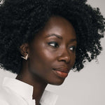 Beautiful golden bird on the ear