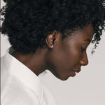 Small gold earrings by Ekenberg