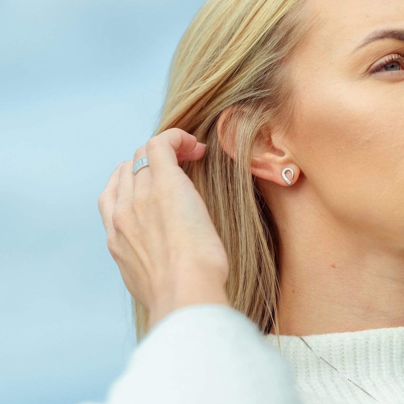 Small rounded silver earrings