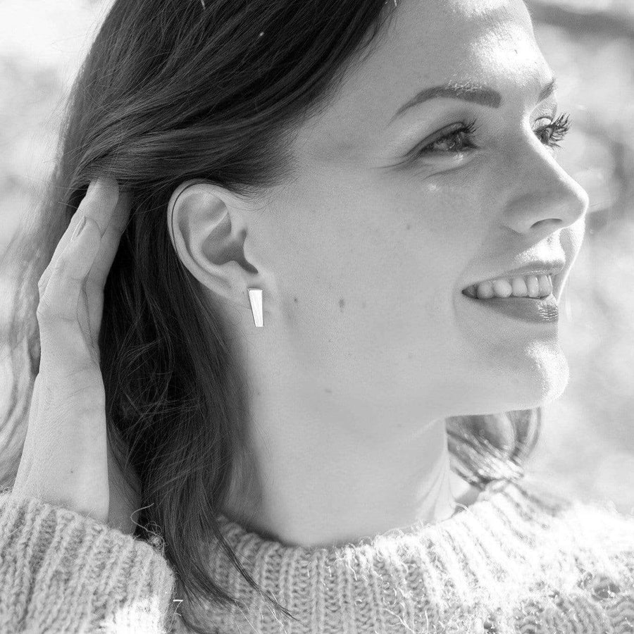 Glossy gold earrings for her