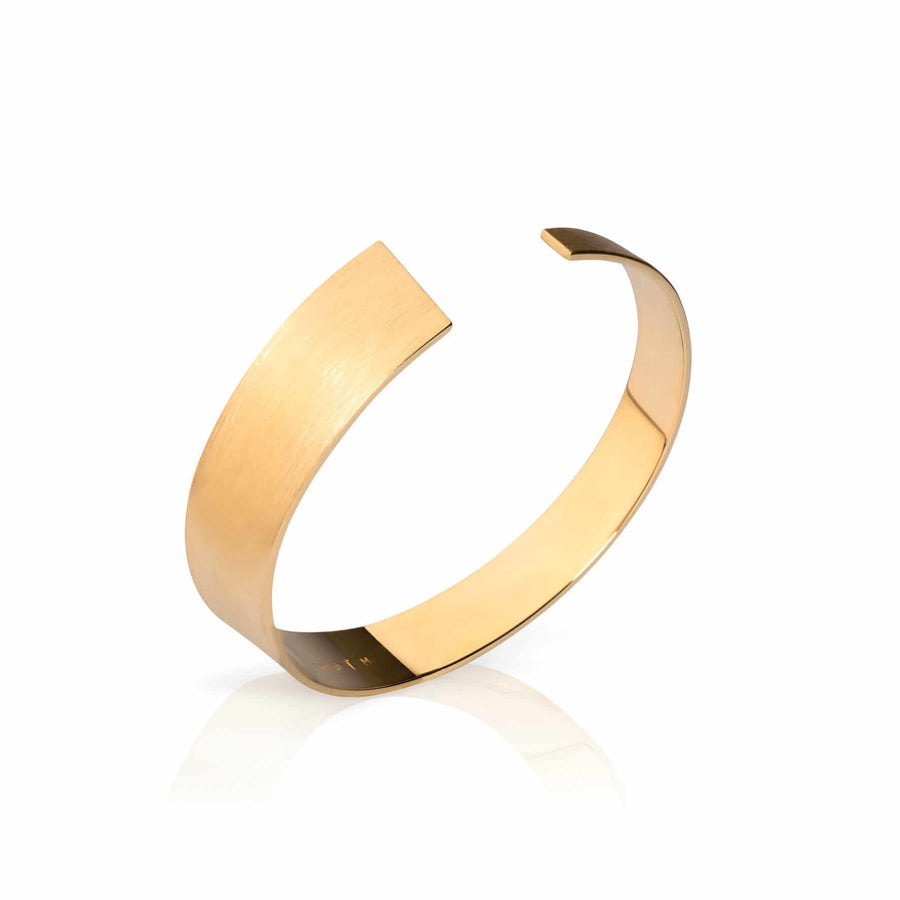 Exclusive gold bangle with a matte surface  by Ekenberg Scandinavia