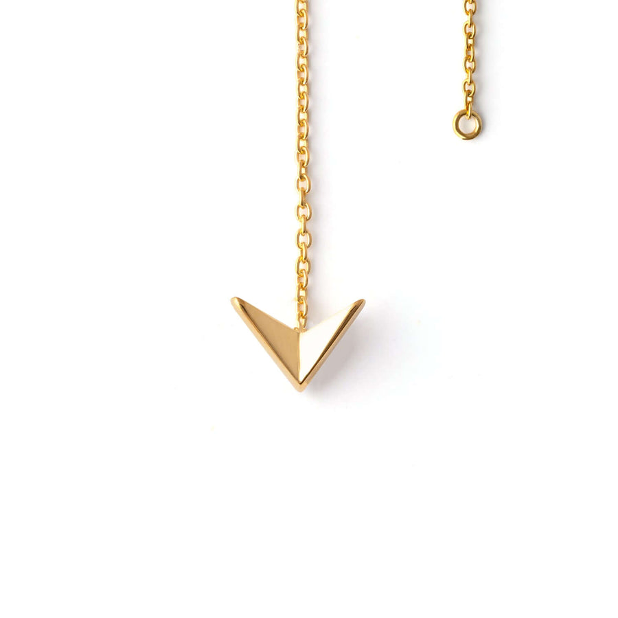 Long gold earrings by Ekenberg