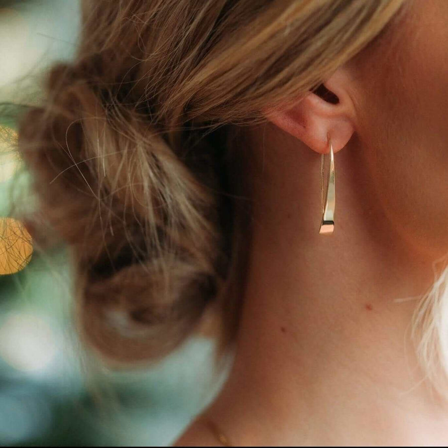 Gold earrings for her