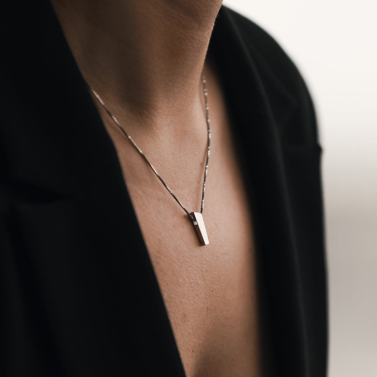 Minimalist silver pendant inspired by the Norwegian scenery